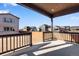 Backyard view from covered patio, showing neighboring houses at 13502 E 100Th Ave, Commerce City, CO 80022