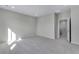 Spacious loft area with carpeted floors and natural light at 13502 E 100Th Ave, Commerce City, CO 80022