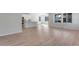 Spacious living area featuring hardwood floors and lots of natural light at 13502 E 100Th Ave, Commerce City, CO 80022