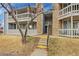 Exterior view of a two-story building with stairs and balconies at 8600 E Alameda Ave # 104, Denver, CO 80247