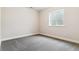 Simple bedroom with neutral wall paint and carpet at 3827 N Elk St, Aurora, CO 80019