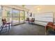 Lobby area with seating, mailboxes, and exit at 585 S Alton Way # 2C, Denver, CO 80247