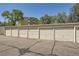 Row of garages with individual access doors at 585 S Alton Way # 2C, Denver, CO 80247