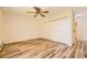 Spacious bedroom with ceiling fan and ample closet space at 585 S Alton Way # 2C, Denver, CO 80247