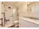 Updated bathroom with walk-in shower and marble vanity at 585 S Alton Way # 2C, Denver, CO 80247