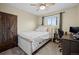 Second bedroom with carpet and ceiling fan at 5747 S Lowell Blvd, Littleton, CO 80123