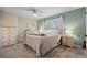 Main bedroom with carpet and ceiling fan at 5747 S Lowell Blvd, Littleton, CO 80123