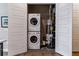 Stackable washer and dryer in a closet with additional storage space at 20 Wilcox St # 621, Castle Rock, CO 80104