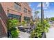 Outdoor patio with fire pit and seating, adjacent to a restaurant at 20 Wilcox St # 621, Castle Rock, CO 80104