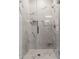 Large walk-in shower with marble tile at 20 Wilcox St # 621, Castle Rock, CO 80104