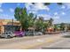 Bustling street scene with shops and restaurants under string lights at 20 Wilcox St # 621, Castle Rock, CO 80104