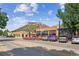 A charming street lined with shops and restaurants, a mountain in the background at 20 Wilcox St # 621, Castle Rock, CO 80104