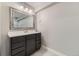 Bathroom with vanity and large mirror at 10288 Mica Way, Parker, CO 80134