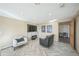 Finished basement with a fireplace, comfortable seating, and a home office at 5380 N Lariat Dr, Castle Rock, CO 80108