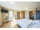 Bedroom with private access to a patio and full bathroom at 5380 N Lariat Dr, Castle Rock, CO 80108
