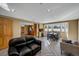 Open dining area with kitchen access and large windows with beautiful views at 5380 N Lariat Dr, Castle Rock, CO 80108