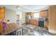 Well-equipped kitchen featuring wood cabinets and a large island at 5380 N Lariat Dr, Castle Rock, CO 80108