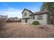 View of the home's backyard at 8521 Golden Eye Dr, Parker, CO 80134