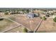 Aerial view of house and expansive backyard with a white fence at 9508 E 147Th Ave, Brighton, CO 80602