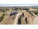 Two-story house on a large lot with a view of the surrounding area at 9508 E 147Th Ave, Brighton, CO 80602