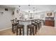 L-shaped basement bar with rustic design and seating at 9508 E 147Th Ave, Brighton, CO 80602