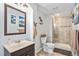 Basement bathroom with shower and vanity at 9508 E 147Th Ave, Brighton, CO 80602