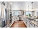 Updated kitchen featuring stainless steel appliances and granite countertops at 9508 E 147Th Ave, Brighton, CO 80602