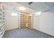 Unfinished basement with built-in shelving for extra storage at 13413 W 21St Ave, Golden, CO 80401