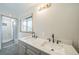 Double vanity bathroom with modern quartz countertop at 13413 W 21St Ave, Golden, CO 80401