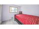 Small bedroom with double bed and window at 13413 W 21St Ave, Golden, CO 80401