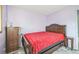 Primary bedroom with double bed and wooden furniture at 13413 W 21St Ave, Golden, CO 80401