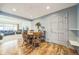 Bright dining area with a round table and access to backyard at 13413 W 21St Ave, Golden, CO 80401