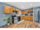 View of kitchen with stainless steel appliances and wood cabinets at 13413 W 21St Ave, Golden, CO 80401