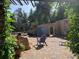 Relaxing brick courtyard with pergola and lush landscaping at 5280 S University Blvd, Greenwood Village, CO 80121