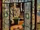 Ornate stained-glass doors leading to a stone patio at 5280 S University Blvd, Greenwood Village, CO 80121