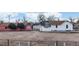 Property with two buildings, one pink and one white at 480 N 6Th Ave, Brighton, CO 80601