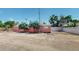 Pink commercial building exterior for lease, with parking at 480 N 6Th Ave, Brighton, CO 80601