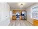 Updated kitchen featuring modern cabinetry and a breakfast nook at 480 N 6Th Ave, Brighton, CO 80601