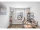 Home office with window seat, desk, and built-in shelving at 15373 E 113Th Pl, Commerce City, CO 80022