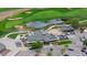 Aerial of clubhouse near golf course and community at 15373 E 113Th Pl, Commerce City, CO 80022