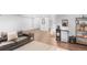 Spacious finished basement with comfortable seating and extra storage at 15373 E 113Th Pl, Commerce City, CO 80022