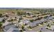 An aerial view of a residential neighborhood with houses and streets at 15373 E 113Th Pl, Commerce City, CO 80022