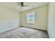 Spacious bedroom with ceiling fan and window at 14595 Vancouver Pl, Parker, CO 80134