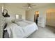 Spacious bedroom with walk-in closet and dresser at 14595 Vancouver Pl, Parker, CO 80134