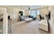 Bonus room with large sectional sofa and workspace at 14595 Vancouver Pl, Parker, CO 80134
