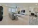 Spacious bonus room with TV and comfortable seating at 14595 Vancouver Pl, Parker, CO 80134