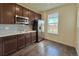 Well-equipped kitchenette with stainless steel appliances at 14595 Vancouver Pl, Parker, CO 80134