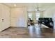 Bright entryway with wood-look floors and home office at 14595 Vancouver Pl, Parker, CO 80134