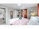 Bright bedroom with a comfortable queen-size bed and plenty of natural light at 5395 Independence St, Arvada, CO 80002