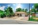 Charming ranch house with a neat front yard and driveway at 5395 Independence St, Arvada, CO 80002